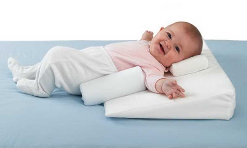 Виды позиционеров для сна новорожденного и отзывы