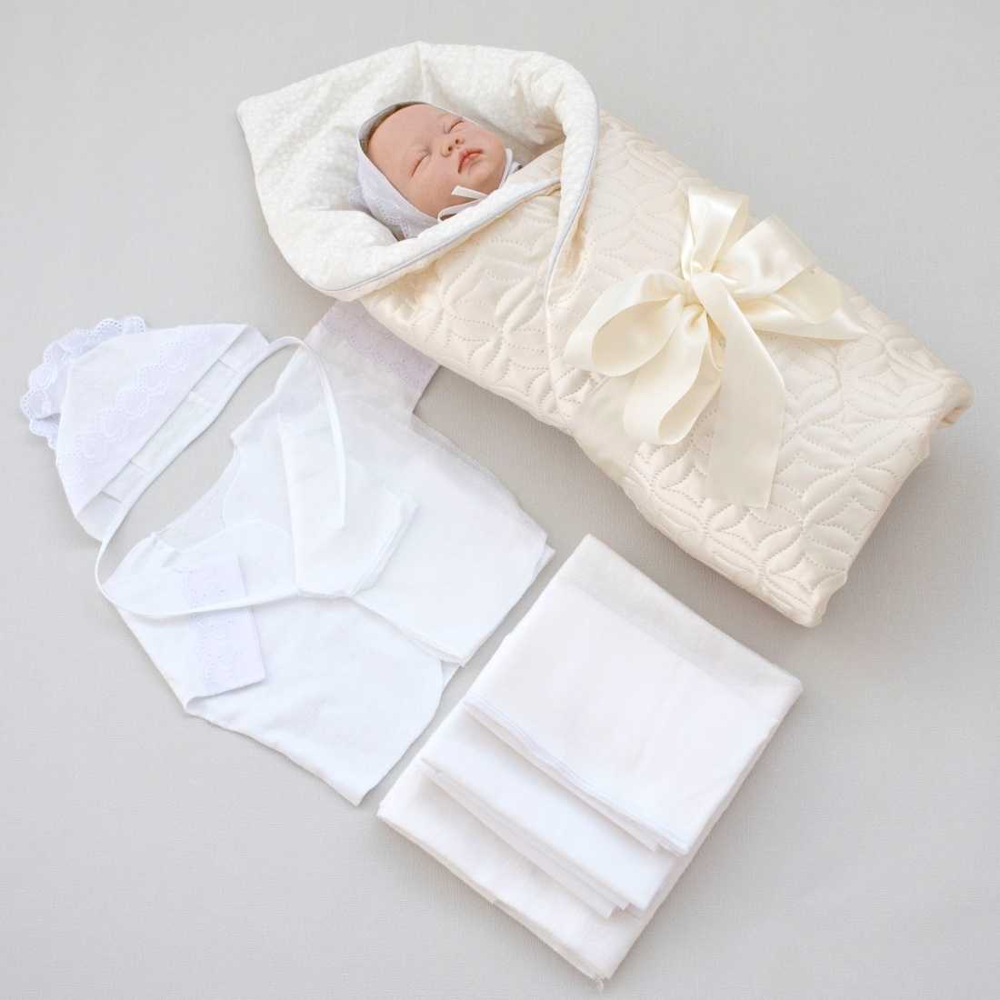 Как связать спицами теплые и практичные конверты для новорожденных