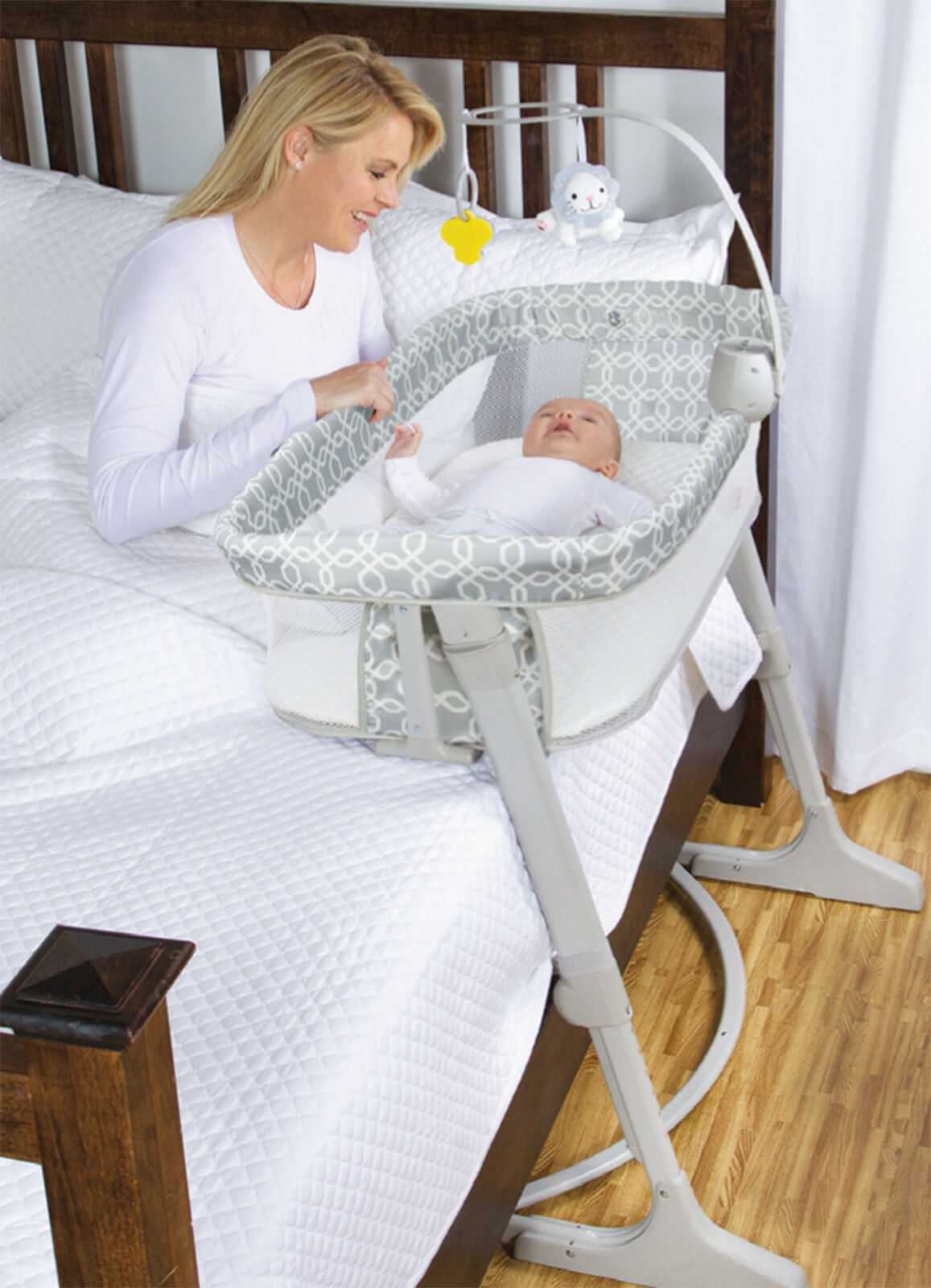 Приставная кроватка для новорожденных: виды и правила выбора
